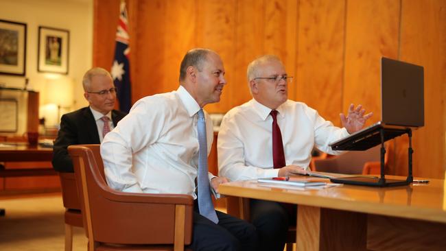 Prime Minister Scott Morrison, Treasurer Josh Frydenberg and Minister for Communications Paul Fletcher chat with Google’s Sundar Pichai during a meeting in February. Picture: Adam Taylor