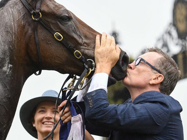 Trainer David Vandyke kisses Alligator Blood after victory in race 5, the Cs Hayes Stakes, during Black Caviar the Great Horse Race Day at Flemington Racecourse in Melbourne, Saturday, February 15, 2020. (AAP Image/Vince Caligiuri) NO ARCHIVING, EDITORIAL USE ONLY