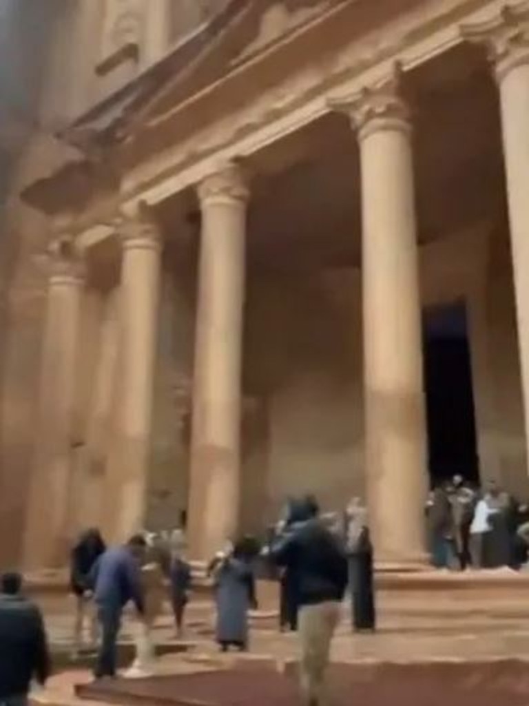Tourists rushed to find higher ground as the water rose.