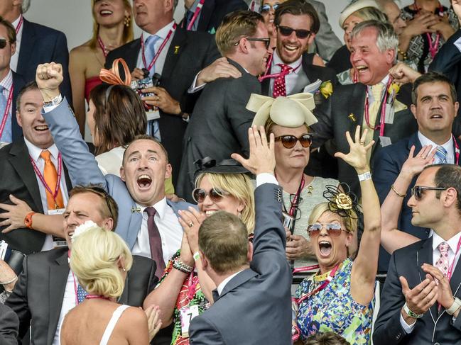 2014 Melbourne Cup at Flemington Race Course. Protectionist Connections celebrating the win. Picture: Jason Edwards.