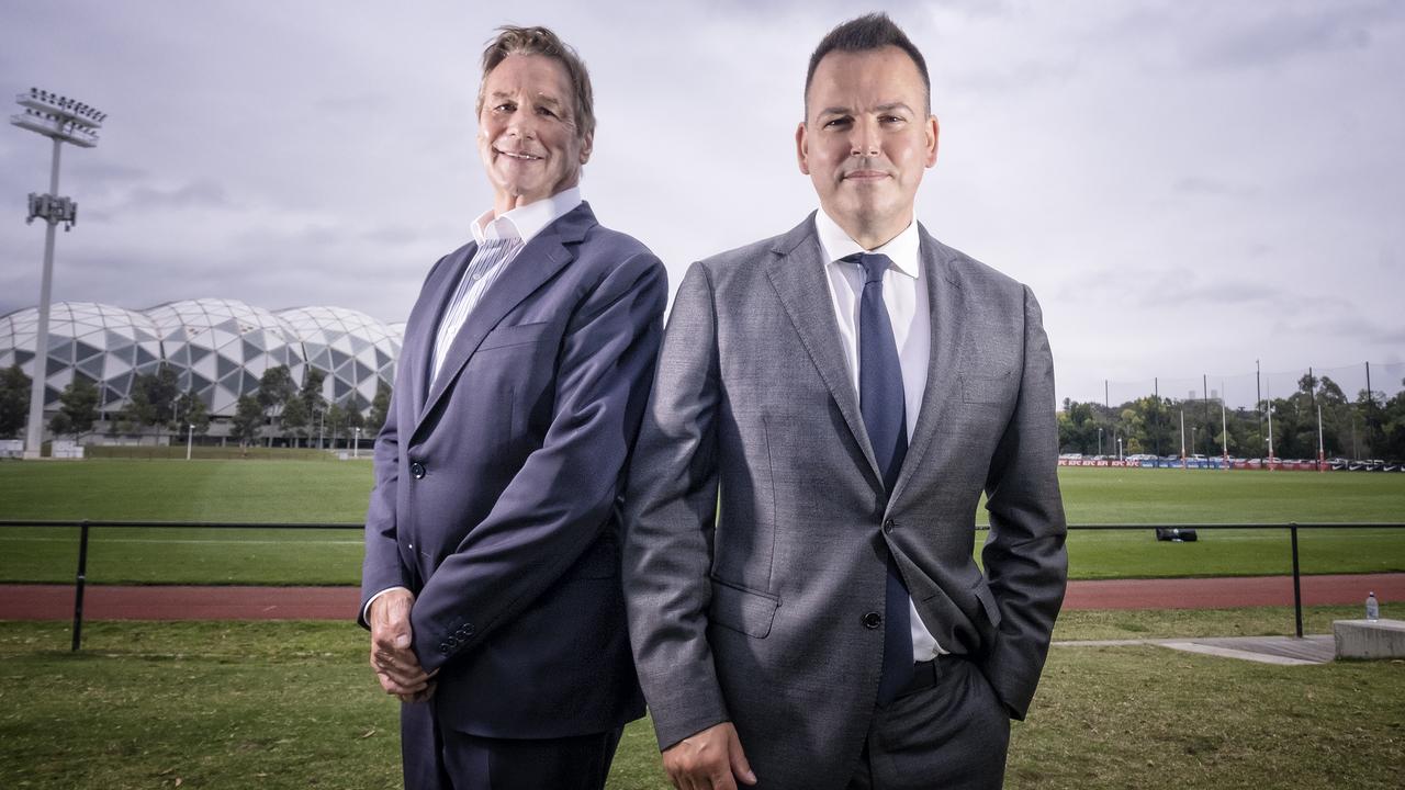 Tom Browne (right) with father and Collingwood president Jeff Browne. Picture: Luis Enrique Ascui