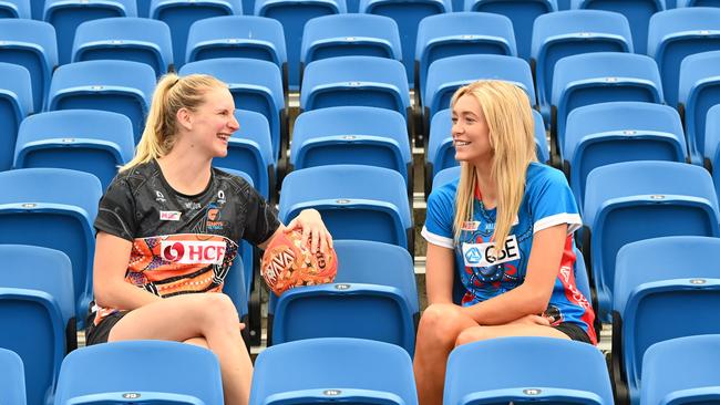 (LtoR) Netballers April Brandley (Giants) and Helen Housby (Swifts).