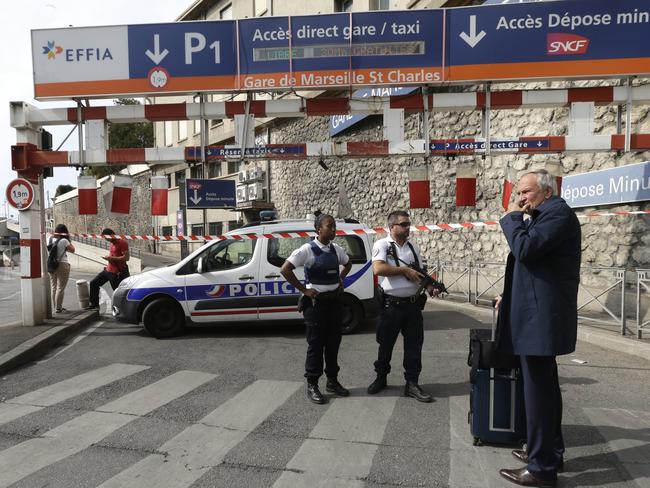 French police officers patrol outside the Marseille railway station. Picture: AP Photo/Claude Paris