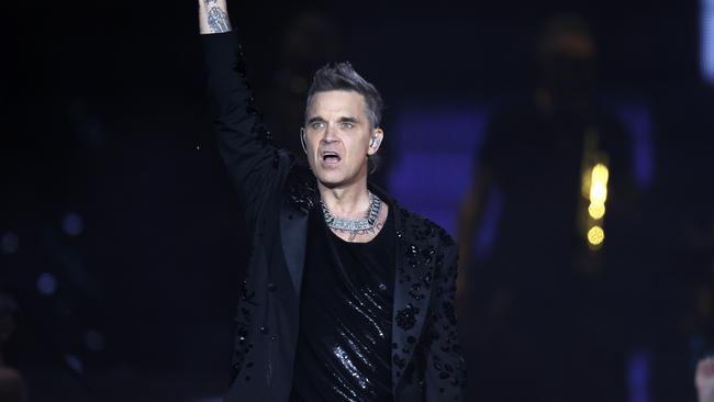DAILY TELEGRAPH NOVEMBER 16, 2023. Robbie Williams on stage during his concert at Allianz Stadium in Sydney. Picture: Jonathan Ng