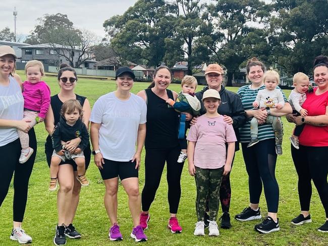 Some of Lisa's clients after a training session on a football field.