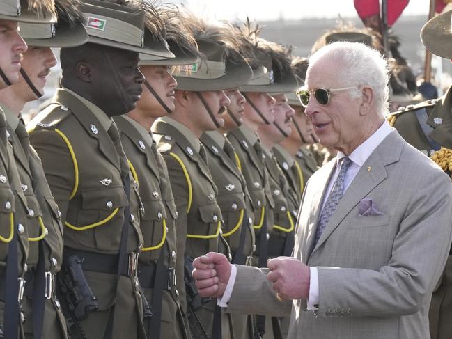 SYDNEY, AUSTRALIA - OCTOBER 22: Britain's King Charles III, right, gestures beside honor guards during his visit to Sydney Opera House on October 22, 2024 in Sydney, Australia. The King's visit to Australia is his first as monarch, and the Commonwealth Heads of Government Meeting (CHOGM) in Samoa will be his first as head of the Commonwealth. (Photo by Mark Baker - Pool/Getty Images)