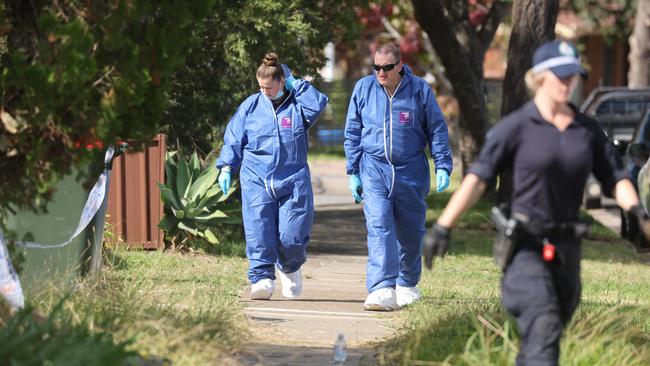 Forensics officers at the crime scene in Quakers Hill. Picture: Tim Hunter