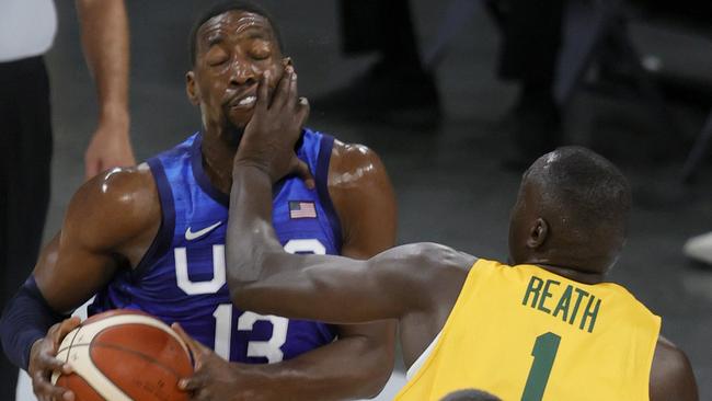 LAS VEGAS, NEVADA – JULY 12: Duop Reath #1 of the Australia Boomers fouls Bam Adebayo #13 of the United States during an exhibition game at Michelob Ultra Arena ahead of the Tokyo Olympic Games on July 12, 2021 in Las Vegas, Nevada. Ethan Miller/Getty Images/AFP == FOR NEWSPAPERS, INTERNET, TELCOS &amp; TELEVISION USE ONLY ==