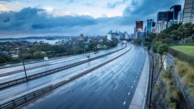 Empty roads on the northern side of The Sydney Harbour Bridge as Sydney residents comply with the COVID lockdown. Picture: Julian Andrews