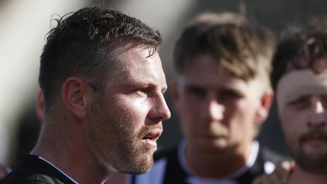 Glenorchy coach Josh Arnold speaking to the playing group at 3/4 time. Picture: Nikki Davis-Jones