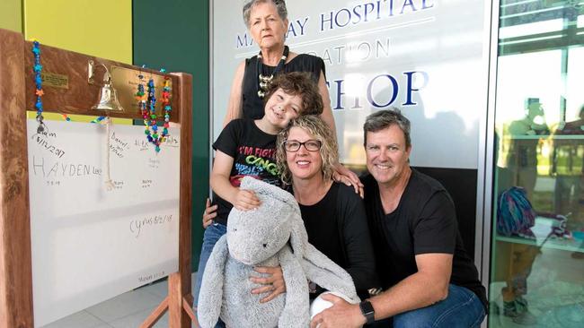 Hayden Lee with his parents, Nyree and Tony, and grandmother Jayne Pendergast after ringing the &#39;last chemo bell&#39;. Picture: Emma Murray