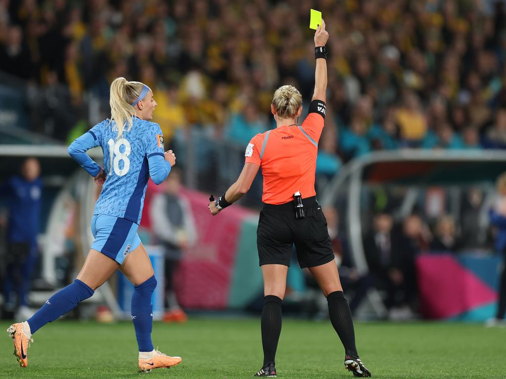 Chloe Kelly of England is shown a yellow card by referee Tori Penso during the match. Picture: Catherine Ivill/Getty Images