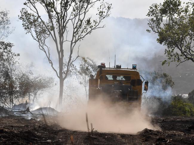 Scrub fire at Julago, just south of Townsville, causes delays to traffic on Bruce Highway. Rural Fire fighters from Nome. Picture: Evan Morgan