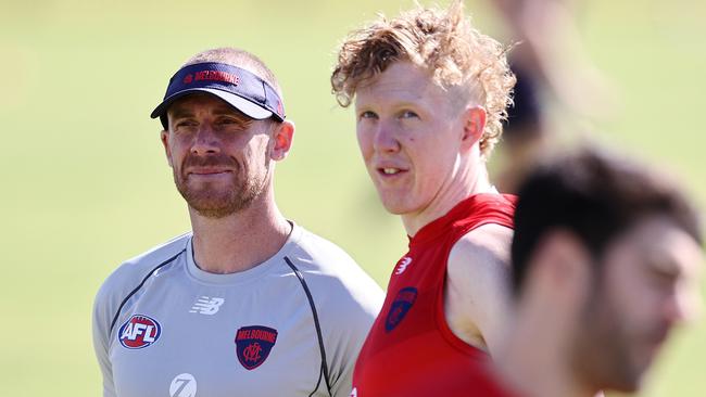 Simon Goodwin with Clayton Oliver at training. Photo by Michael Klein/