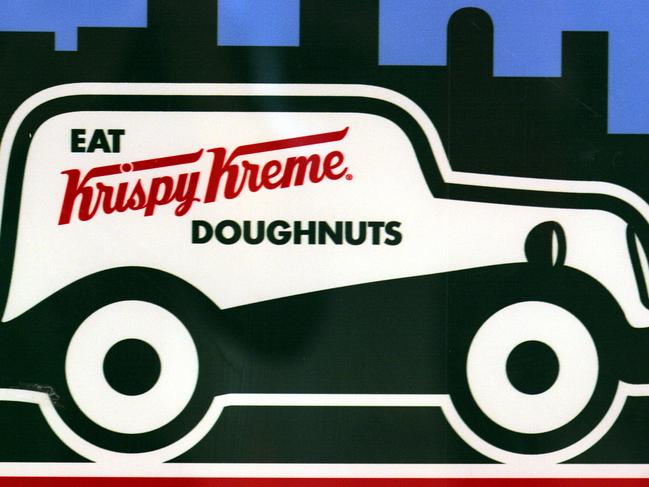 Generic of a Krispy Kreme van with 'Eat Krispy Kreme doughnuts' written on the side.