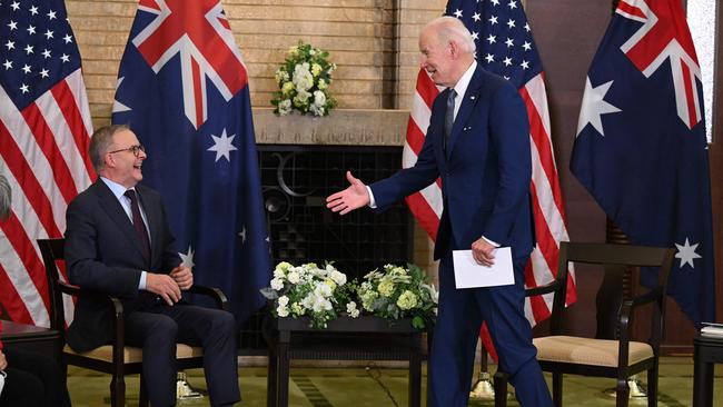 Joe Biden prepares to shake hands with Anthony Albanese as the two leaders became fast friends at the Quad Leaders Summit. Picture: AFP.