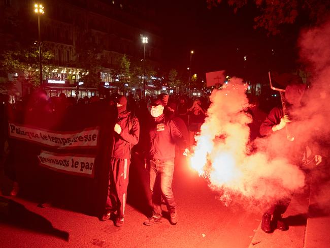 Thousands of supporters of the left-wing Front Populaire march in streets in Paris as riot police are dispatched. Picture: Getty