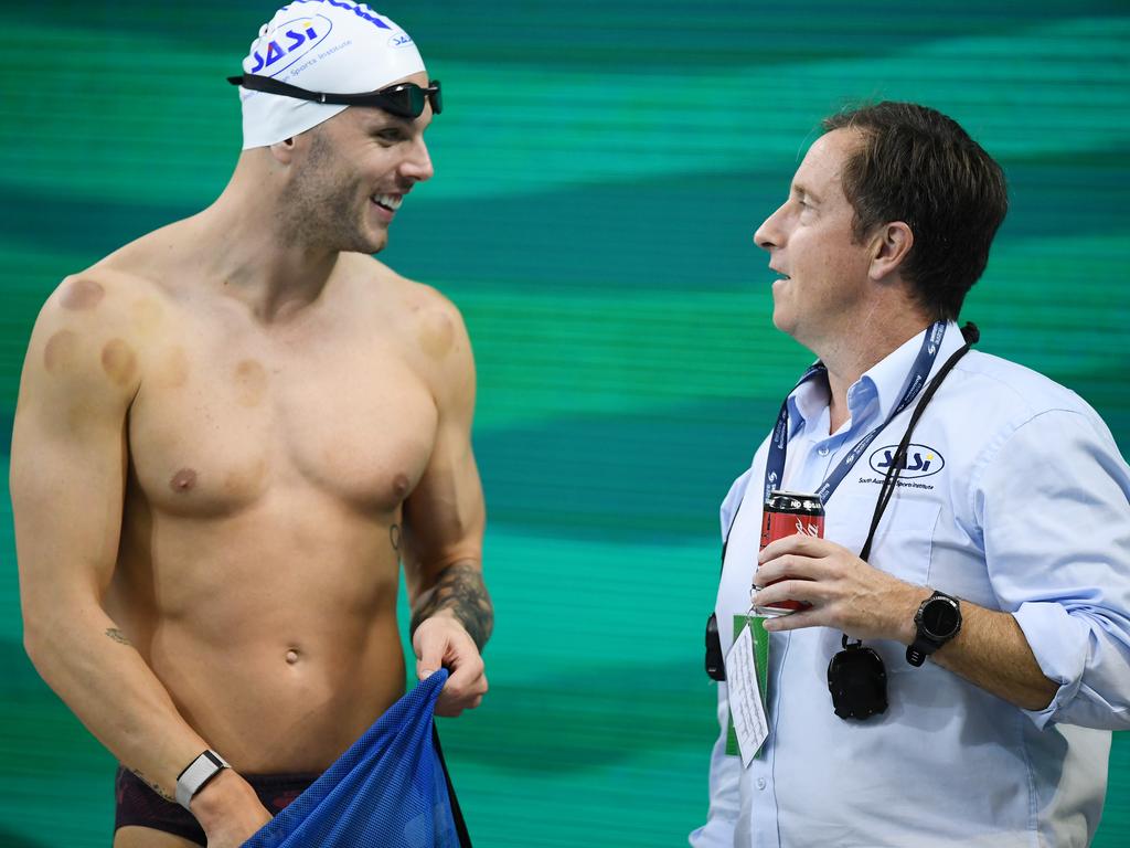 Kyle Chalmers and coach Peter Bishop at the Australian Olympic trials in June. Picture: Mark Brake/Getty Images