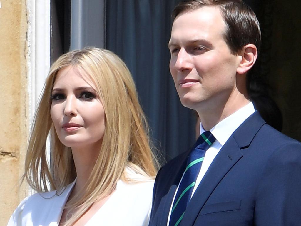 Ivanka Trump and husband Jared Kushner, Senior Advisor to the President of the United States, watch from a balcony. Picture: Toby Melville / AFP