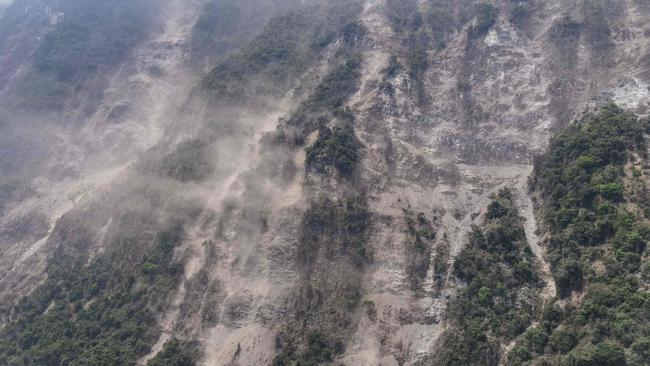 Mud ashe covering Ching-shui Cliff in Hualien. Picture: AFP