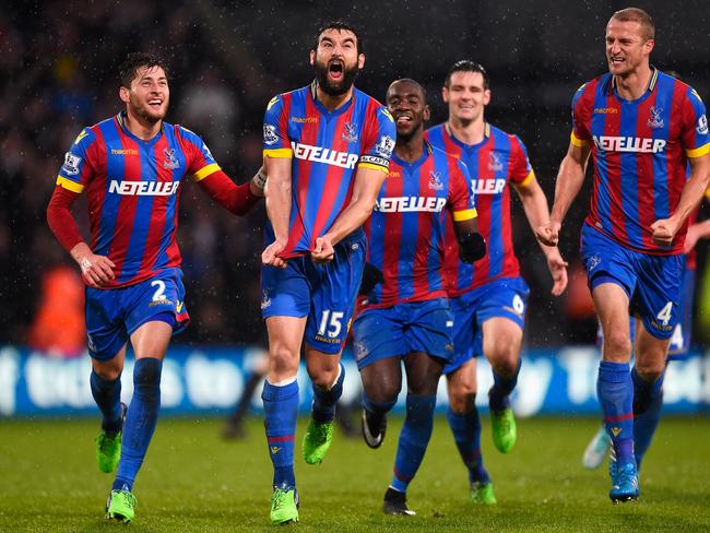 LONDON, ENGLAND - NOVEMBER 23: Mile Jedinak of Crystal Palace celebrates scoring his team's third goal with team mates during the Barclays Premier League match between Crystal Palace and Liverpool at Selhurst Park on November 23, 2014 in London, England. (Photo by Mike Hewitt/Getty Images)