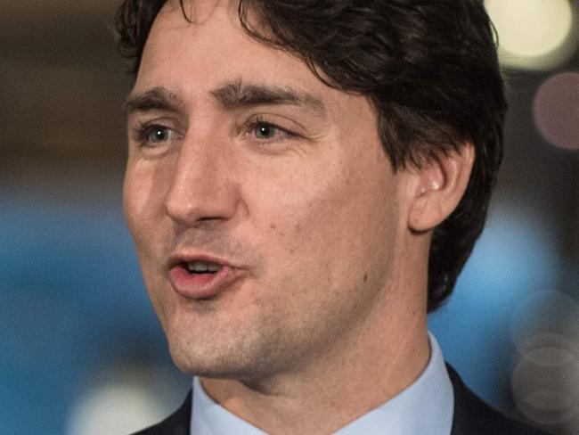 Canadian Prime Minister Justin Trudeau delivers a speech at the Youville workshop of the Société des Transports de Montréal (STM), in Montreal, Quebec, on April 6, 2016. / AFP PHOTO / Alice CHICHE