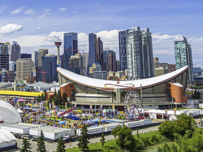 13 July 2019 - Calgary, Alberta, Canada - The Calgary Stampede Grounds with Calgary's Skyline.Escape 4 June 2023Destinations Photo - iStock