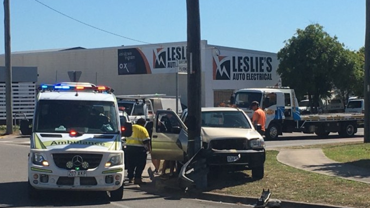 Paramedics assist man after Garbutt crash into pole | NT News