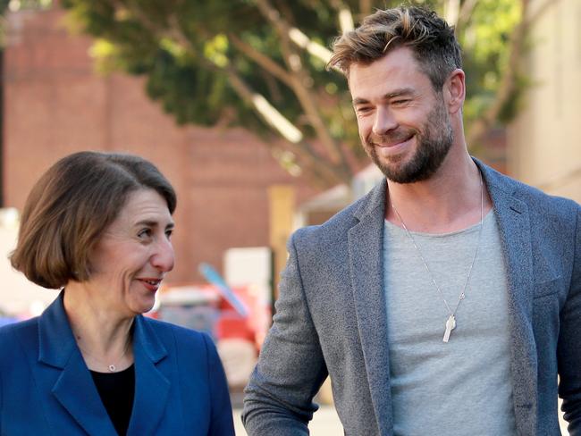 SYDNEY, AUSTRALIA - NewsWire Photos APRIL, 19, 2021: Pictured is Gladys Berejiklian arriving with actor Chris Hemsworth and producer Doug Mitchell at Fox Studios Australia in Sydney for a major blockbuster announcement of Mad Max sequel Furiosa, that will be filmed in NSW. Picture: NCA NewsWire / Dylan Coker