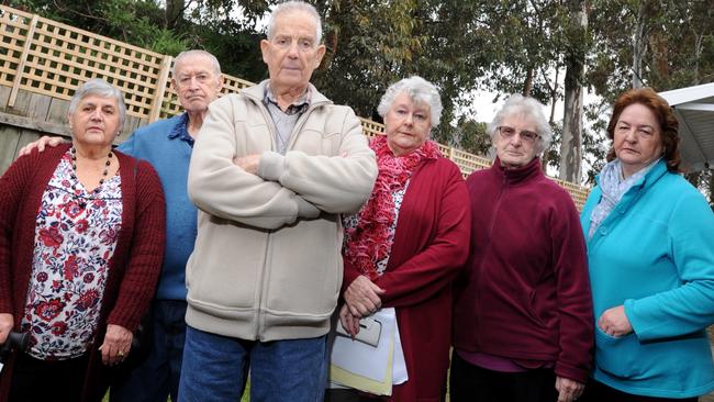 Bill Cook (centre) with fellow residents Joan and Brian Douds, Marion Adams, Chris Cook and Rosemary Evans. They are angry about the decision to give the tower the go ahead. Picture: Andrew Henshaw