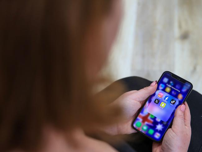 NEWCASTLE, AUSTRALIA - DECEMBER 01: In this photo illustration, social media networking apps are displayed on a phone screen on December 01, 2024 in Newcastle, Australia. Australia has recently enacted a groundbreaking law prohibiting individuals under the age of 16 from accessing social media platforms, marking one of the strictest regulations of its kind globally. This legislation, which holds social media companies accountable for enforcing the ban with potential fines of up to AUD 50 million, aims to protect young users from online dangers such as bullying and exploitation, reflecting a significant shift in how governments address youth safety in the digital age. (Photo illustration by Roni Bintang/Getty Images)