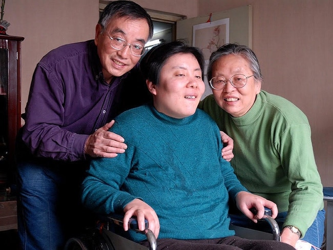 Zhu Ling in 2013 with her parents.