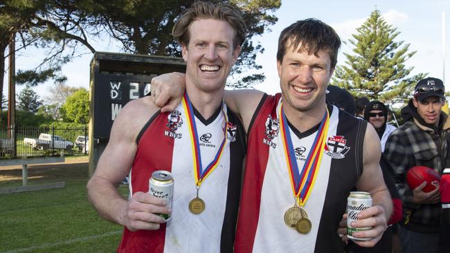 Tom and Sam Jonas celebrate Western Districts’ big grand final win. Picture: Brett Hartwig