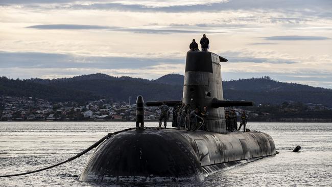 HOBART, AUSTRALIA - APRIL 01: Royal Australian Navy submarine HMAS Sheean arrives for a logistics port visit on April 1, 2021 in Hobart, Australia.