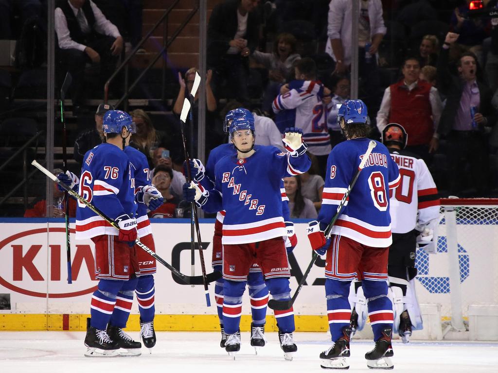 Lias and the Rangers celebrate.