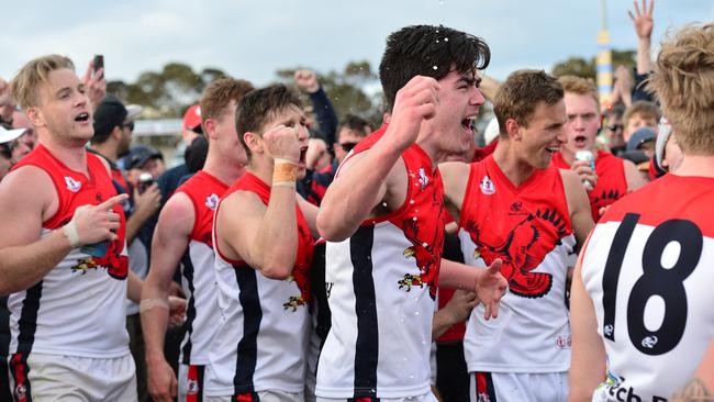 Jubilant Flagstaff Hill players after the club’s fourth successive flag win. Picture: AAP/Keryn Stevens