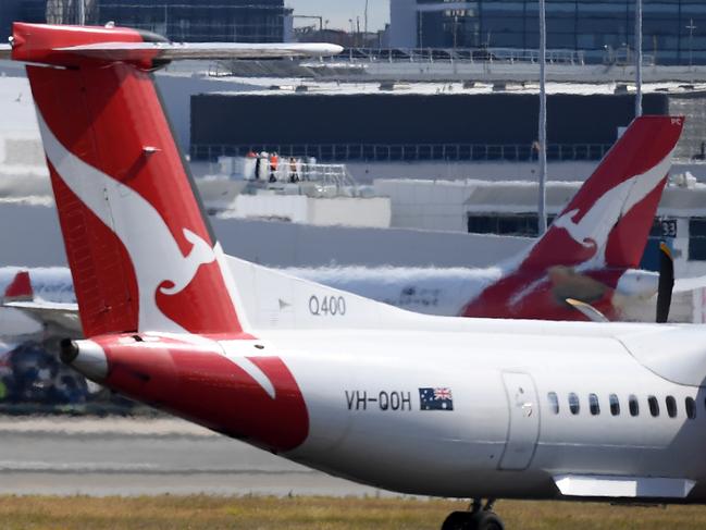 Qantas aircraft are seen at Sydney Airport, in Sydney, Wednesday, August 22, 2018. (AAP Image/Dan Himbrechts) NO ARCHIVING