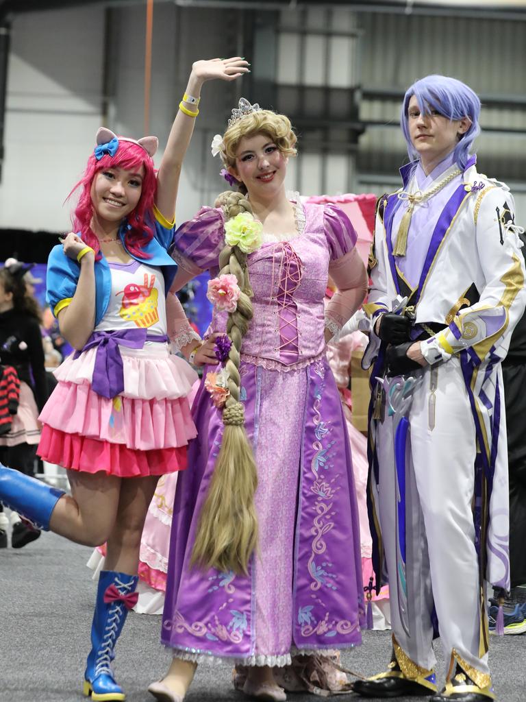 Supanova Comic Con at Adelaide Showground. Naomi Tang (Pinky Pie), Jasmine Straka (Rapunzel) and Brayden Schwartz (Ayato).Picture: Dean Martin