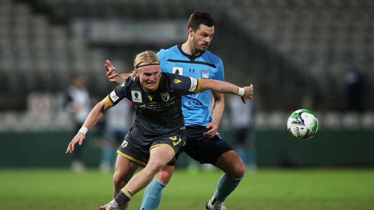 Sydney FC defender James Donachie (right) battles with Macarthur FC’s Lachlan Rose. Picture: Matt King/Getty Images