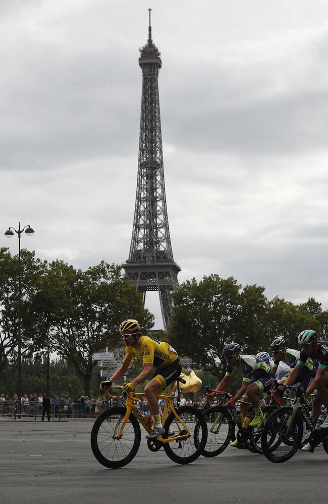 Tour de France winner Britain's Geraint Thomas passing another French landmark. (AP Photo/Francois Mori)