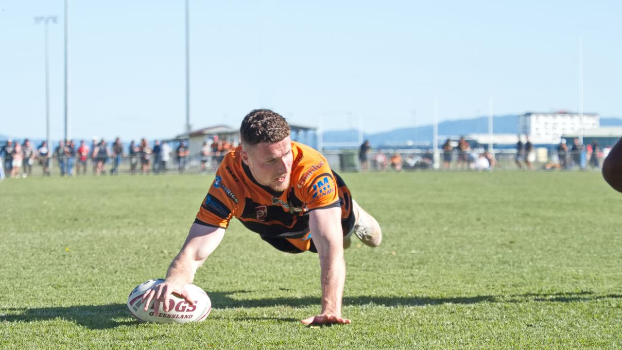 Wests Connor McDermott lands a try. Picture: Marty Strecker