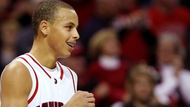 Stephen Curry of the Davidson Wildcats reacts to his team's 72-67 victory over the North Carolina State Wolfpack during their game at Time Warner Cable Arena on December 6, 2008.