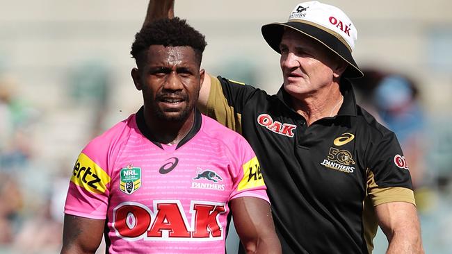 James Segeyaro goes off with a broken arm.