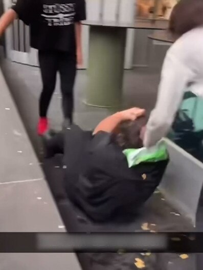 The group turned on a woman at Southern Cross Station.