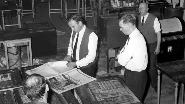 Rupert Murdoch checks pages of The Australian in 1964
