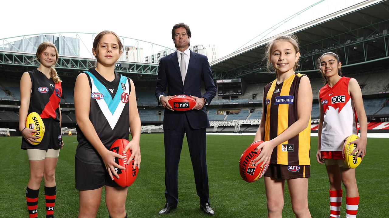 AFL CEO Gillon McLachlan with junior players representing the four newest AFLW clubs. Picture: Michael Klein