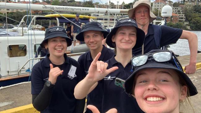 Cadence Ogilvie (bottom) with her new-found friends as they embark on the Young Endeavour leadership program.