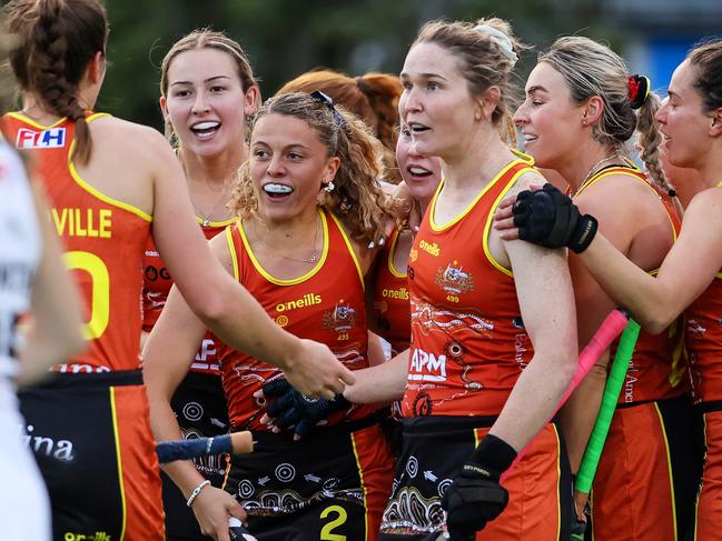 The Hockeyroos swamp Rosie Malone after her equaliser against the Black Sticks. Picture: BW Media