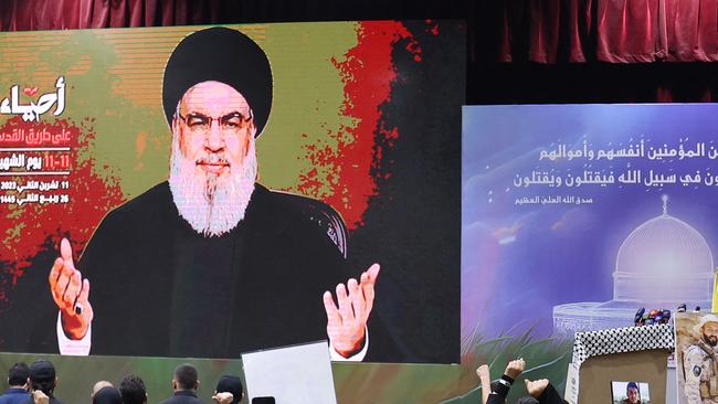 A screen in Beirut with Hezbollah chief Hassan Nasrallah delivering a televised address. Picture: AFP