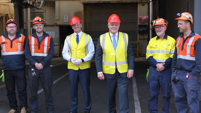 Prime Minister Scott Morrison attends a walk through with Angus Taylor MP, Minister Energy and Emissions Reduction at BlueScope Steel in Port Kembla. Picture: NCA NewsWire / Simon Bullard